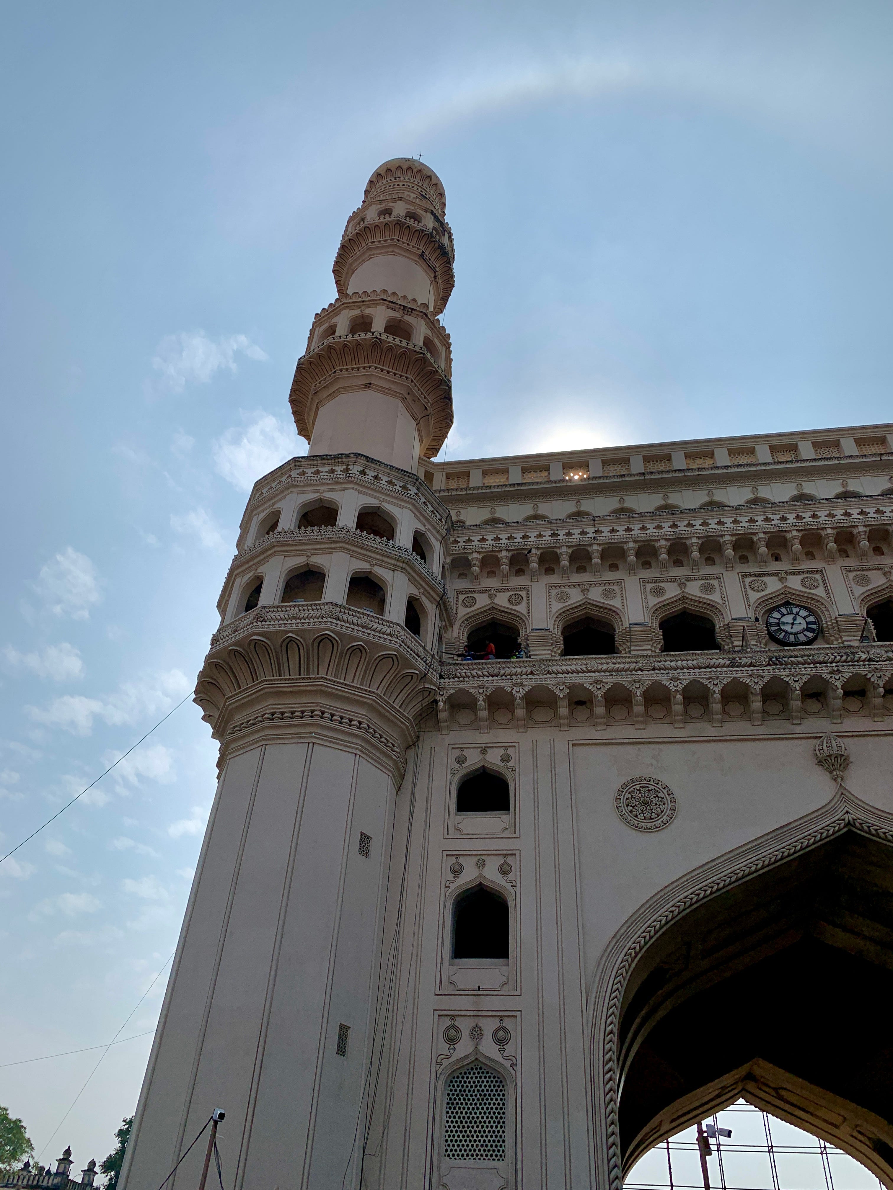 A day view of Charminar, looking up at one of its towering minarets.